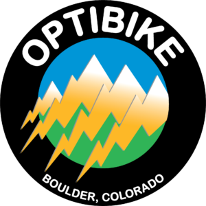 Optibike logo featuring mountains in the shape of lightning bolts framed by a black circle